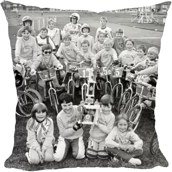 Proud as punch - these TV star BMX riders show off their latest trophy. 20th August 1986
