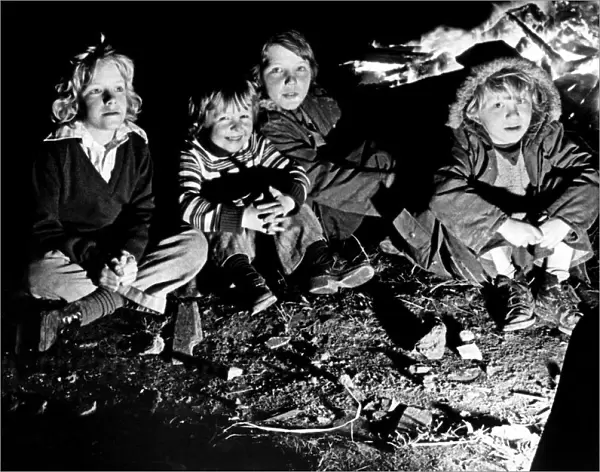 The thrills of Guy Fawkes night are reflected in the faces of these youngsters as they