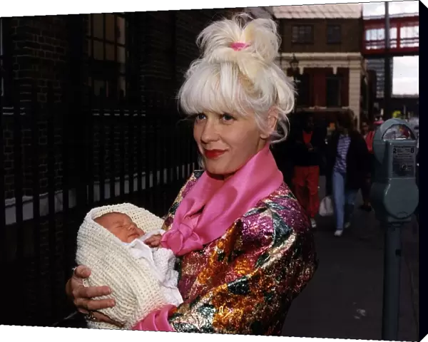 Paula Yates, wife of Bob Geldof, leaves hospital today with her new born baby daughter
