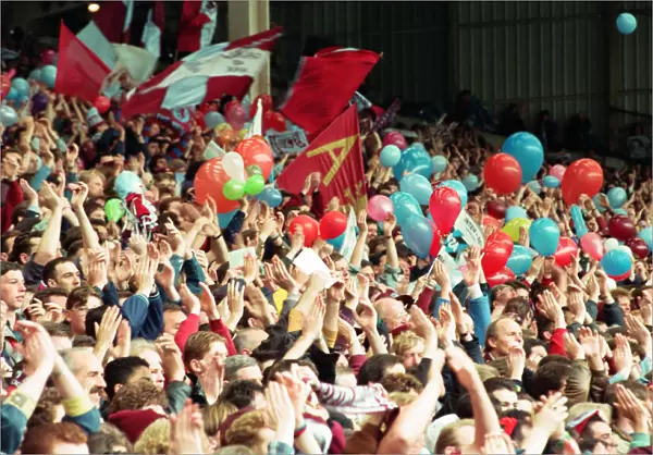Fans in the Holte End stand in the final game before it was demolished