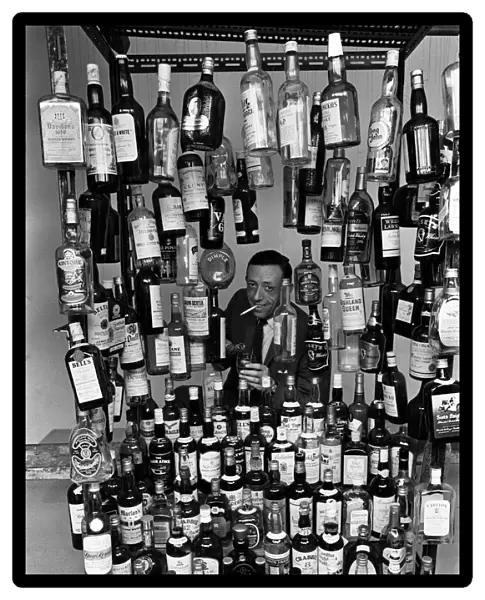 Sunday Mirror writer Stanley Shivas with the 137 best selling Scottish whiskeys
