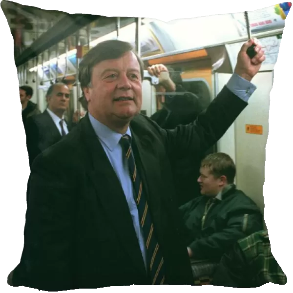 KENNETH CLARKE MP TRAVELLING ON THE LONDON UNDERGROUND ON DISTRICT LINE ON WAY TO BARONS