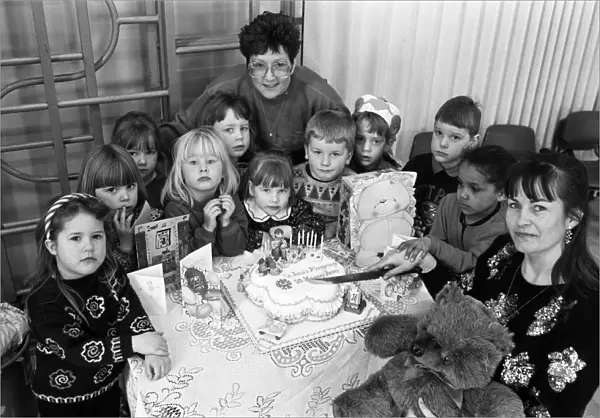 Ten years on... Mrs Lesley Holmes (right), leader of St Johns playgroup in Golcar