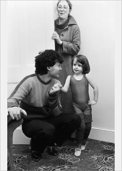 Snooker player Jimmy White with his three and a half year old daughter Lauren at home in