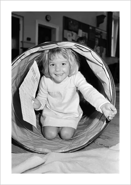Tunnelling for sponsorship cash is four-year old Helen Copley who took part in an
