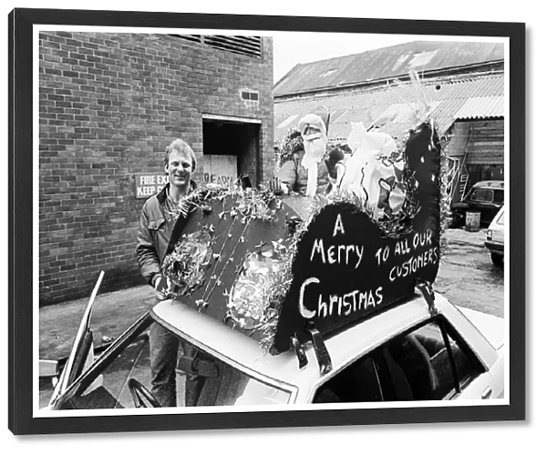 Father Christmas on top of a taxi. Teesside, December 1985
