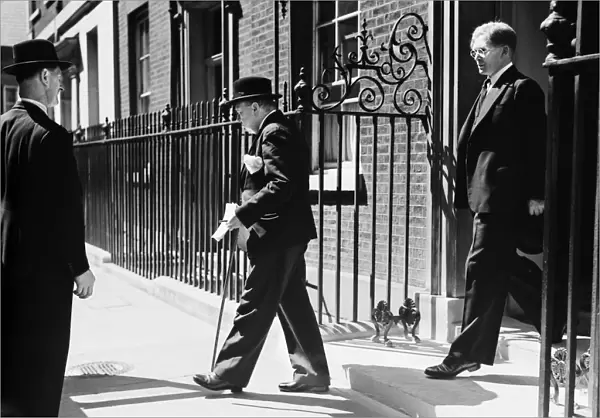 British Prime Minister Winston Churchill leaving Number 10 Downing Street for the House