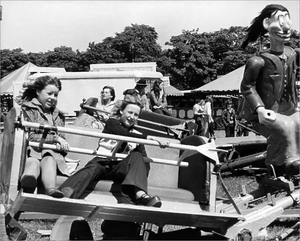 Youngsters on the Roundabout ride at the Hoppings fair, held on the Town Moor in