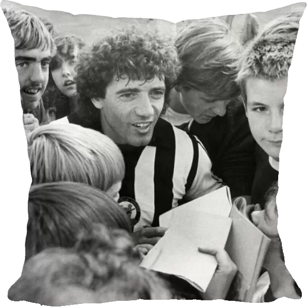 Newcastle United footballer Kevin Keegan is surrounded by young Newcastle fans during a
