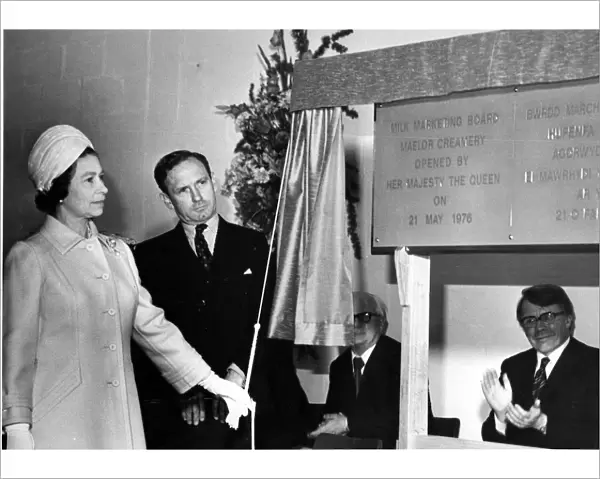 Queen Elizabeth II unveils the opening of the Milk Marketing Board Maelor Creamery at