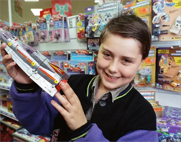 Rocketing success... Gavin Thompson, 13, shows off the starblaster spaceship he invented