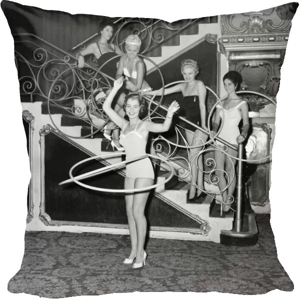 1958 Miss World Beauty Contestants, try out hula hoops at The Lyceum Theatre, London