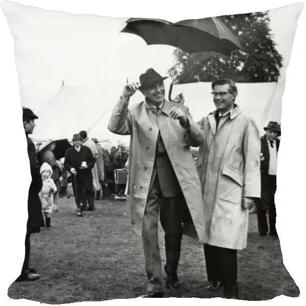 Even the high winds and poring rain couldn t keep the smile from Sir Alec Douglas