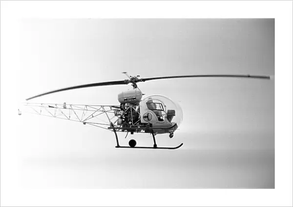 Helicopter above a Pop Concert in Berkshire. Circa 26th  /  27th August 1974