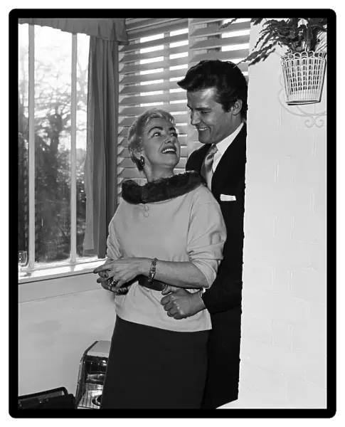 Singer Dorothy Squires photographed at home in Bexley Kent, with her husband Roger Moore