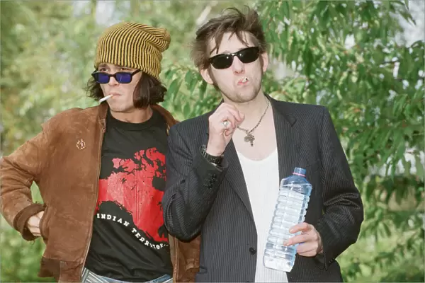 Johnny Depp (left in the hat) and singer Shane MacGowan