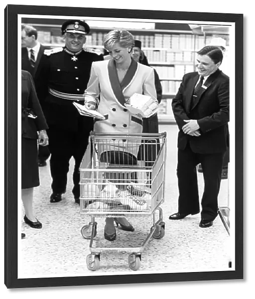 Princess Diana, The Princess of Wales, takes a shopping trolley around Tesco at Southport
