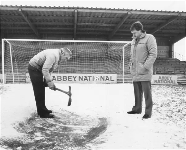 Torquay Uniteds head groundsman Fred King and Dave Easton, commercial manager