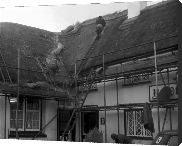 Re-thatching of the Manor Inn at Preston in November 1970