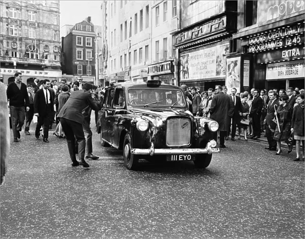 World heavyweight boxer Muhammad Ali arriving at the Odeon Cinema in Leicester Square