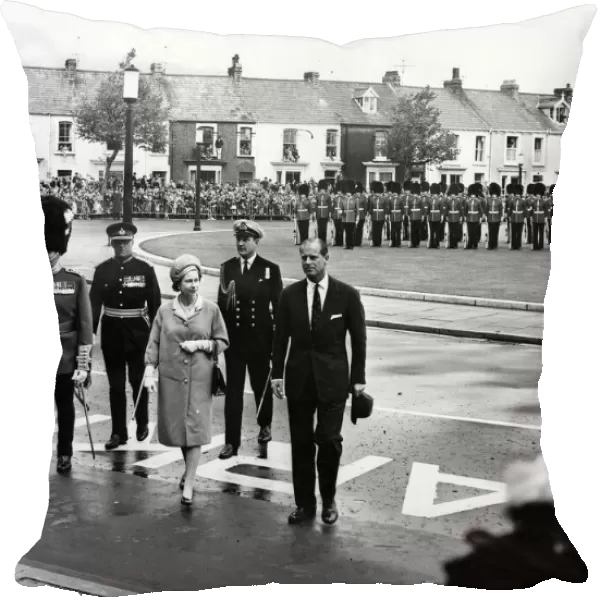 Queen Elizabeth II and Prince Philip, Duke of Edinburgh walk back to the Guildhall