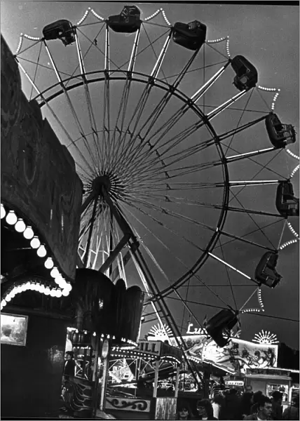 The big wheel silhouetted against the night sky