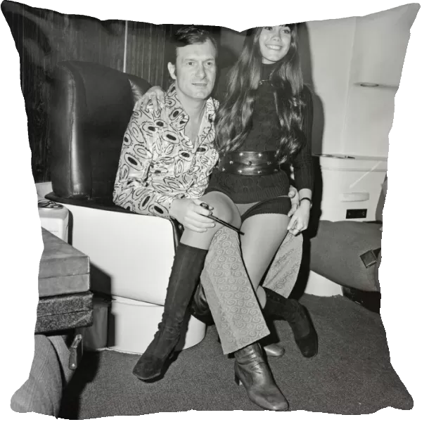 Hugh Hefner pictured in the Playboy Jet with his girlfriend Barbi Benton