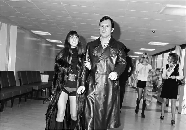 Hugh Hefner and his girlfriend Barbi Benton at Londons Heathrow airport