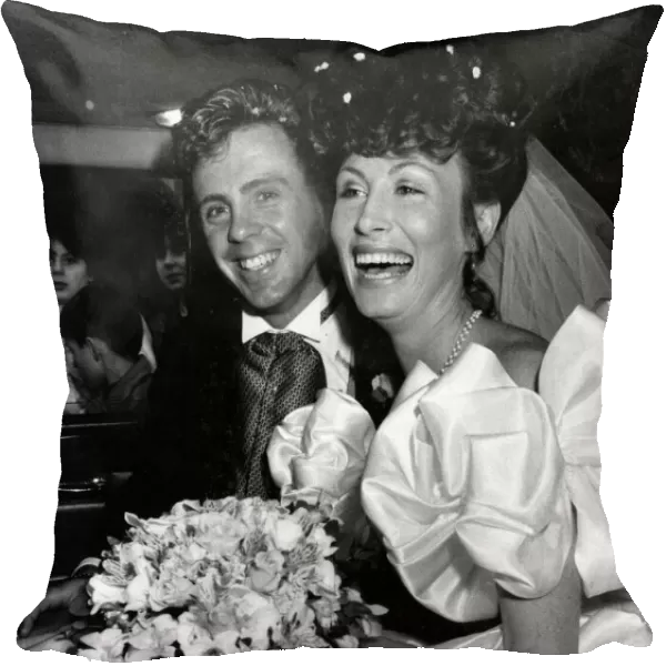 Track star Tom McKean and his childhood sweetheart Yvonne Fraser after their wedding at