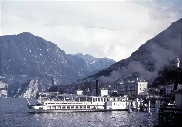 The paddle steamer Sempione arrives at Gandria Village, Lake Lugano