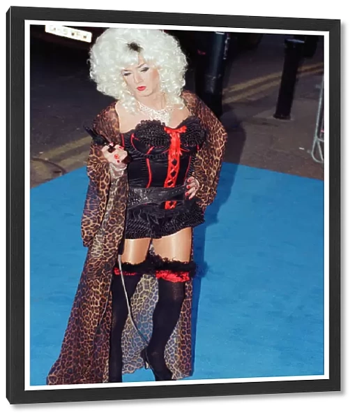 Lily Savage arriving at Elton Johns 50th birthday party at Hammersmith Palais
