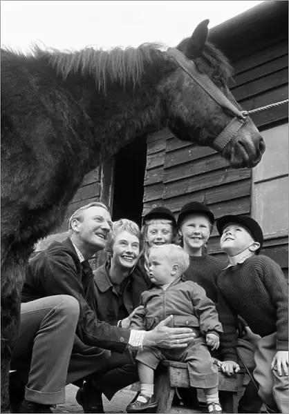 Actor Leslie Phillips with his wife Penelope Bartley and their four children, Caroline