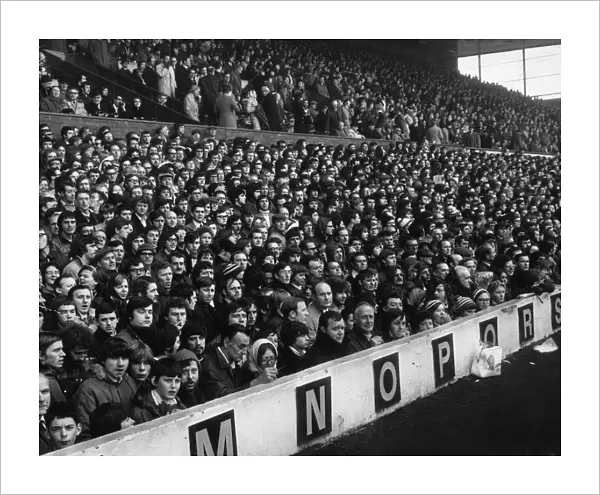 View of the huge crowd at Anfield watching their team Liverpool in action, circa 1966