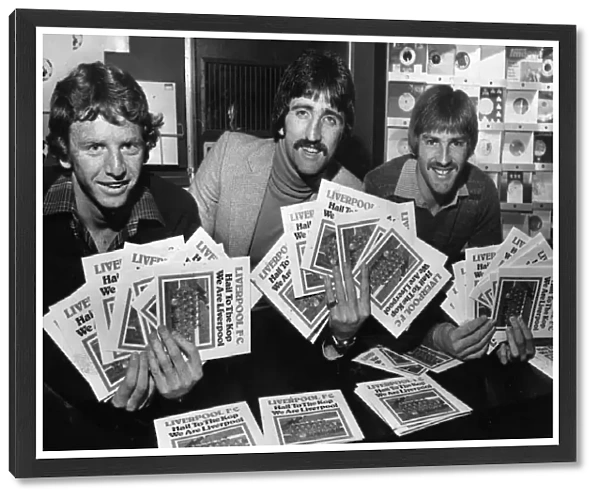 Liverpool players David Fairclough, David Johnson and Steve Heighway sign copies of