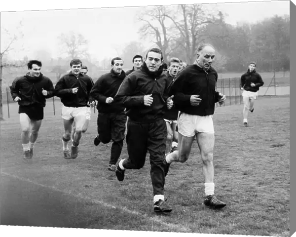 Liverpool players in training led by Reuben Bennett and Ian St John. Circa 1963