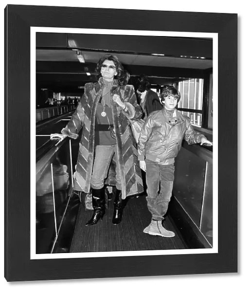 Actress Sophia Loren leaving London Airport for Los Angeles with her son Eduardo