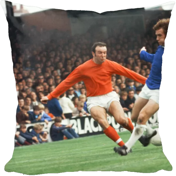 Jimmy Armfield, (playing in orange, for Blackpool) in a playing situation against Everton