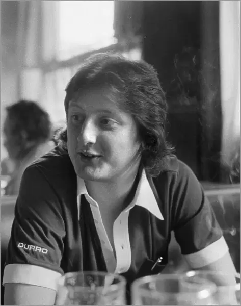 Twenty One year old British darts player Eric Bristow relaxing with a paint at his local
