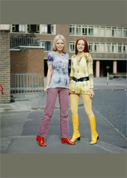 Tie-dye shirts worn by models, Jane (red hair) and Linda (blond hair). 3rd March 1970