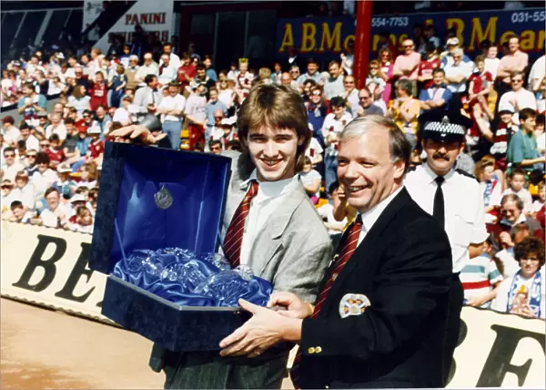 Stephen Hendry accepts Wallace Merchers gift at Tynecastle. 6th May 1990
