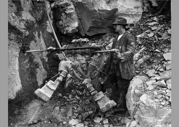 Penlee stone quarry, Newlyn, Cornwall. Rock-boring machine driven by compressed air