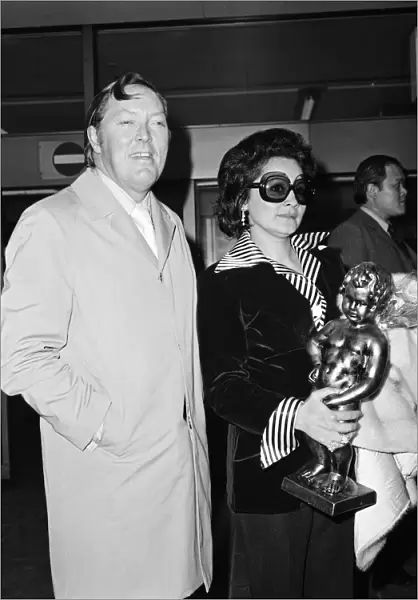 Bill Haley and his wife Martha arrive at Heathrow Airport. 15th May 1974