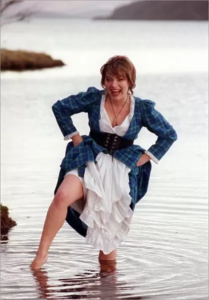 Lorraine Kelly GMTV presenter February 1998 wearing tartan dress wading in Loch