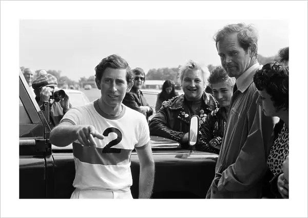 Prince Charles meet Punks during a game of polo. The Punks turned up to the game in