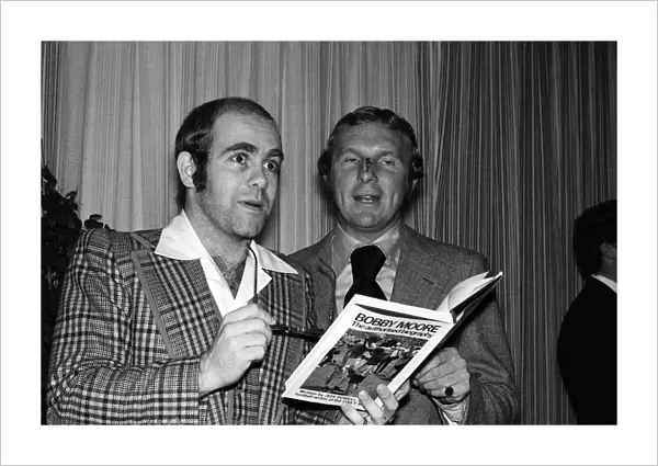 Elton John with Bobby Moore at the launch of Moores book 'Bobby Moore'