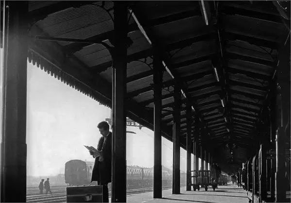 Passenger waiting on platform 4 of Cambridge Station Cambridge 15th June 1964