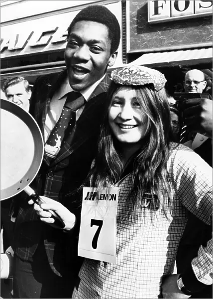 Winner if the Sandwell Mails pancake Day race, Diane Hadley, with comedian Lenny Henry