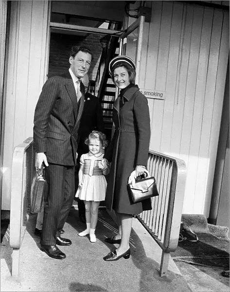 Princess Alexandra and her husband Angus Ogilvy at Heathrow Airport with their daughter