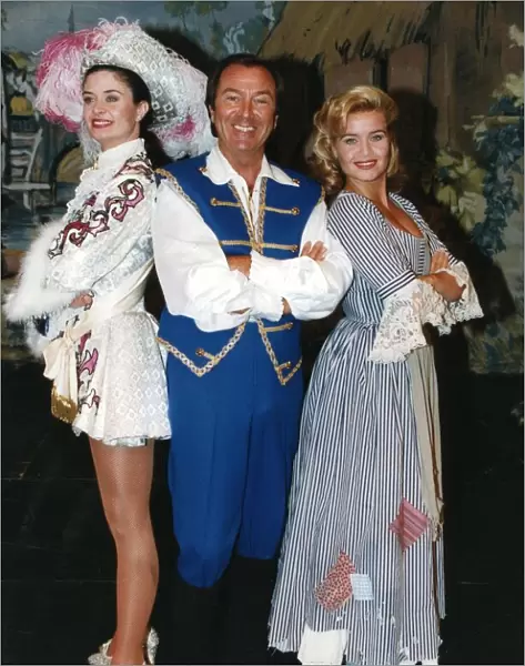 Des O Connor with Jody Wilson and Tracey Wilson in costumes for Cinderella pantomime