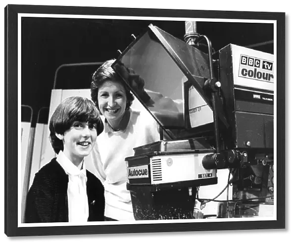 Sue Lawley with schoolgirl in BBC TV studio showing her the autocue - December 1980
